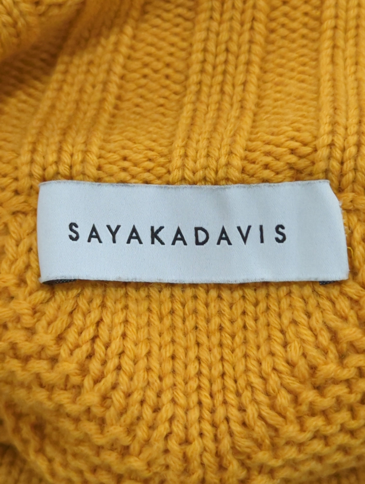 SAYAKA D:CABLE POMPOM SWEATER